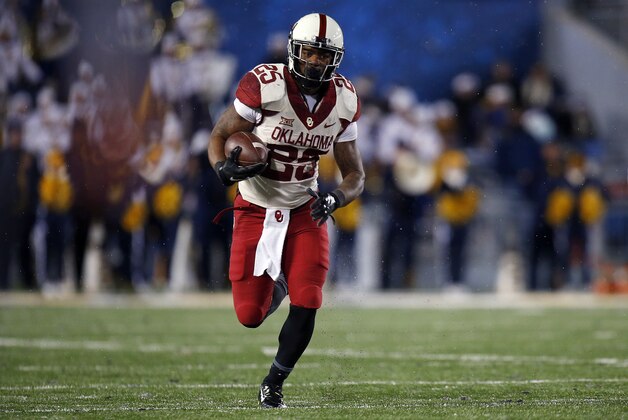 MORGANTOWN, WV - NOVEMBER 19:  Joe Mixon #25 of the Oklahoma Sooners in action against the West Virginia Mountaineers on November 19, 2016 at Mountaineer Field in Morgantown, West Virginia.  (Photo by Justin K. Aller/Getty Images)