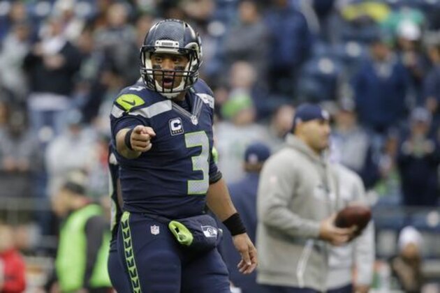 Seattle Seahawks quarterback Russell Wilson gestures during warmups before an NFL football game against Philadelphia Eagles, Sunday, Nov. 20, 2016, in Seattle. (AP Photo/John Froschauer)