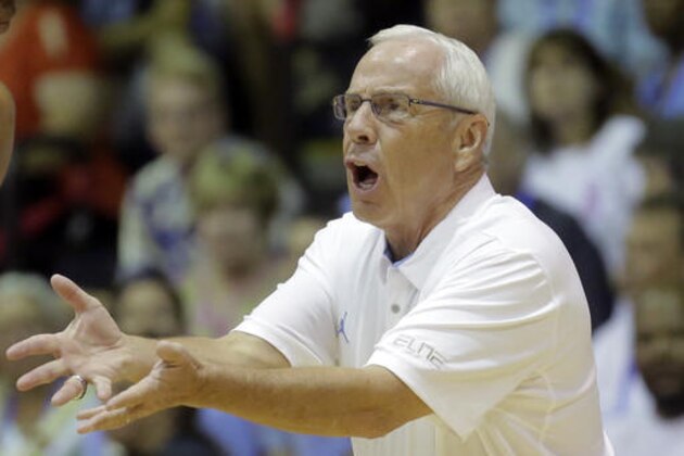 North Carolina head coach Roy Williams shouts to his team in the first half of an NCAA college basketball game against Oklahoma State in the Maui Invitational, Tuesday, Nov. 22, 2016, in Lahaina, Hawaii. (AP Photo/Rick Bowmer)