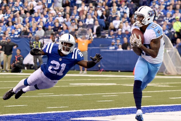 INDIANAPOLIS, IN - NOVEMBER 20:  Tajae Sharpe #19 of the Tennessee Titans breaks free from Vontae Davis #21 of the Indianapolis Colts as he catches a touchdown pass during the third quarter of the game at Lucas Oil Stadium on November 20, 2016 in Indianapolis, Indiana.  (Photo by Stacy Revere/Getty Images)