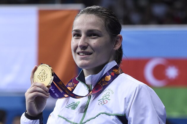 Ireland's Katie Taylor poses with her gold medal after the medal ceremony of the boxing women's light (57-60kg) event at the Baku 2015 European Games in Baku June 27, 2015.  AFP PHOTO / TOBIAS SCHWARZ        (Photo credit should read TOBIAS SCHWARZ/AFP/Getty Images)