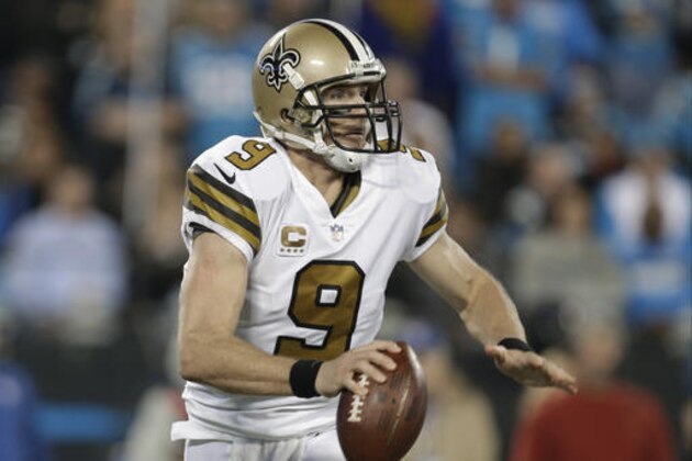 New Orleans Saints' Drew Brees (9) scrambles in the second half of an NFL football game against the Carolina Panthers in Charlotte, N.C., Thursday, Nov. 17, 2016. (AP Photo/Bob Leverone)