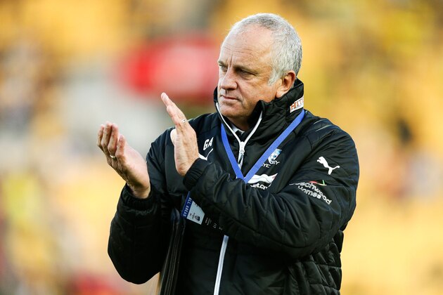 WELLINGTON, NEW ZEALAND - OCTOBER 23:  Coach Graham Arnold of Sydney FC applauds a group of fans during the round three A-League match between the Wellington Phoenix and Sydney FC at Westpac Stadium on October 23, 2016 in Wellington, New Zealand.  (Photo by Hagen Hopkins/Getty Images)