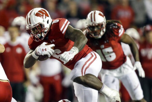Wisconsin running back Corey Clement (6) runs against Nebraska cornerback Joshua Kalu (10) in overtime in an NCAA college football game Saturday, Oct. 29, 2016, in Madison, Wis. Wisconsin beat Nebraska 23-17 in overtime. (AP Photo/Andy Manis)