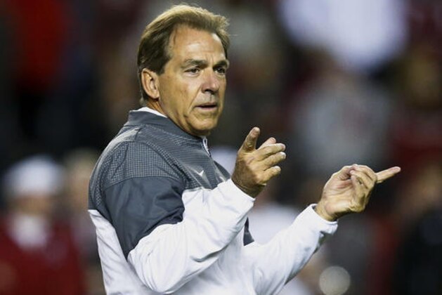 Alabama head coach Nick Saban gestures towards his players before an NCAA college football game against Chattanooga, Saturday, Nov. 19, 2016, in Tuscaloosa, Ala. (AP Photo/Brynn Anderson)