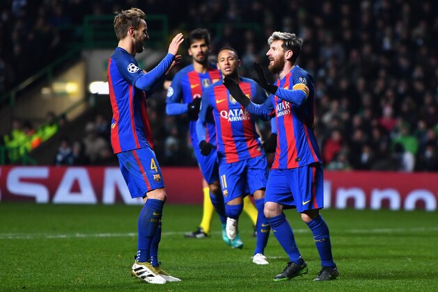 GLASGOW, SCOTLAND - NOVEMBER 23: Lionel Messi of Barcelona (R) celebrates scoring his sides second goal with Ivan Rakitic of Barcelona (L) during the UEFA Champions League Group C match between Celtic FC and FC Barcelona at Celtic Park Stadium on November 23, 2016 in Glasgow, Scotland.  (Photo by Mike Hewitt/Getty Images)