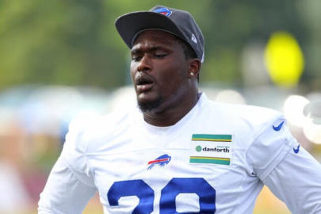 Buffalo Bills running back Karlos Williams (29) takes part in conditioning drills during NFL football training camp in Pittsford, N.Y., Sunday, July 31, 2016. (AP Photo/Bill Wippert)