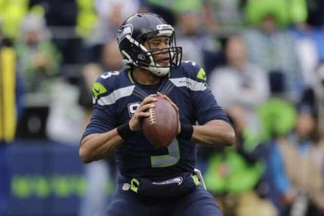 Seattle Seahawks quarterback Russell Wilson looks to pass during in the first half of an NFL football game against the Philadelphia Eagles, Sunday, Nov. 20, 2016, in Seattle. (AP Photo/Stephen Brashear)