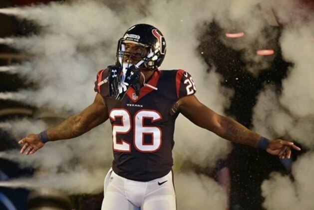 Houston Texans running back Lamar Miller (26) runs on to the field before an NFL football game against the Indianapolis Colts, Sunday, Oct. 16, 2016, in Houston. (AP Photo/Eric Christian Smith)