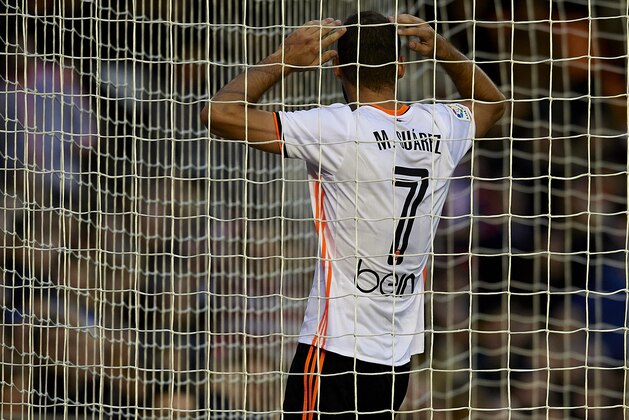 VALENCIA, SPAIN - NOVEMBER 20:  Mario Suarez of Valencia reacts during the La Liga match between Valencia CF and Granada CF at Mestalla Stadium on November 20, 2016 in Valencia, Spain.  (Photo by Manuel Queimadelos Alonso/Getty Images)