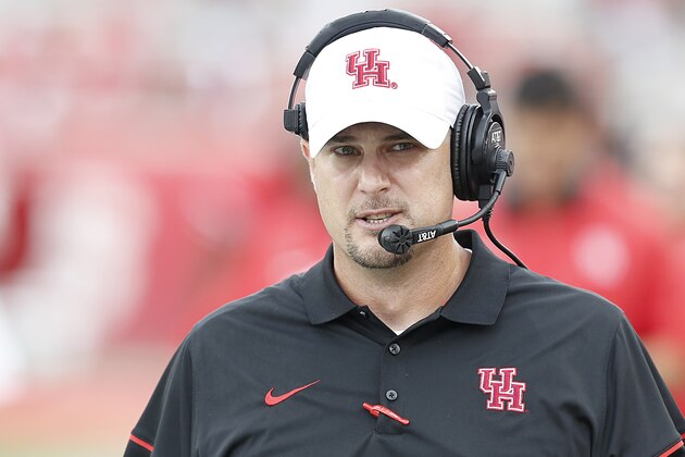 HOUSTON, TX - SEPTEMBER 10: Houston Cougars head coach Tom Herman walks the sidelines as he coaches against the Lamar Cardinals in the second quarter at TDECU Stadium on September 10, 2016 in Houston, Texas. Houston won 42 to 0.  (Photo by Thomas B. Shea/Getty Images)
