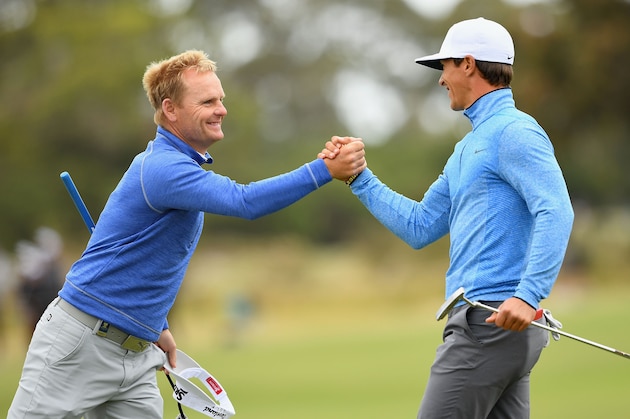 MELBOURNE, AUSTRALIA - NOVEMBER 25:  Soren Kjeldsen and Thorbjorn Olesen of Denmark shake hands after finishing on the 18th during day two of the World Cup of Golf at Kingston Heath Golf Club on November 25, 2016 in Melbourne, Australia.  (Photo by Quinn Rooney/Getty Images)