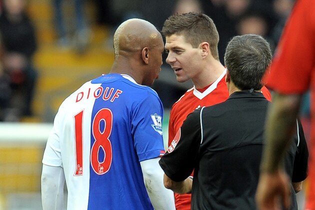 Blackburn Rovers' Senegal midfielder El Hadji Diouf (L) exchanges words with Liverpool's English midfielder Steven Gerrard  during the English Premier League football match football match at Anfield, Liverpool, north-west, England, on February 28, 2010. AFP PHOTO/ ANDREW YATES.  --- RESTRICTED TO EDITORIAL USE Additional licence required for any commercial/promotional use or use on TV or internet (except identical online version of newspaper) of Premier League/Football League photos. Tel DataCo +44 207 2981656. Do not alter/modify photo (Photo credit should read ANDREW YATES/AFP/Getty Images)