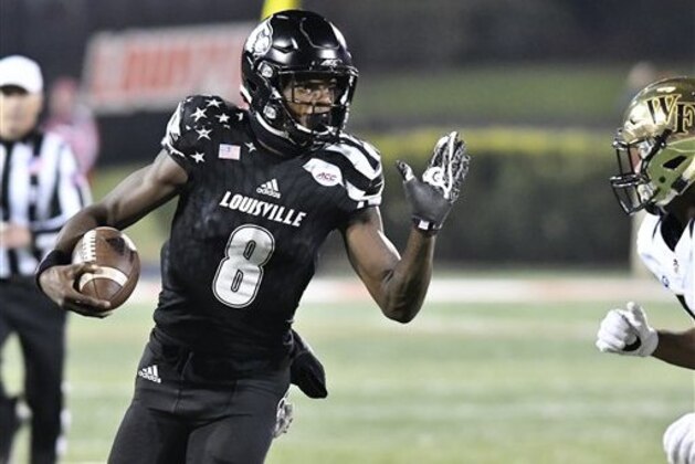 Louisville quarterback Lamar Jackson (8) attempts to evade a Wake Forest pass rusher during the second half of an NCAA college football game against Wake Forest, Saturday, Nov. 12, 2016 in Louisville Ky. (AP Photo/Timothy D. Easley) Louisville quarterback Lamar Jackson (8) attempts to evade a Wake Forest pass rusher during the second half of an NCAA college football game against Wake Forest, Saturday, Nov. 12, 2016 in Louisville Ky. (AP Photo/Timothy D. Easley)