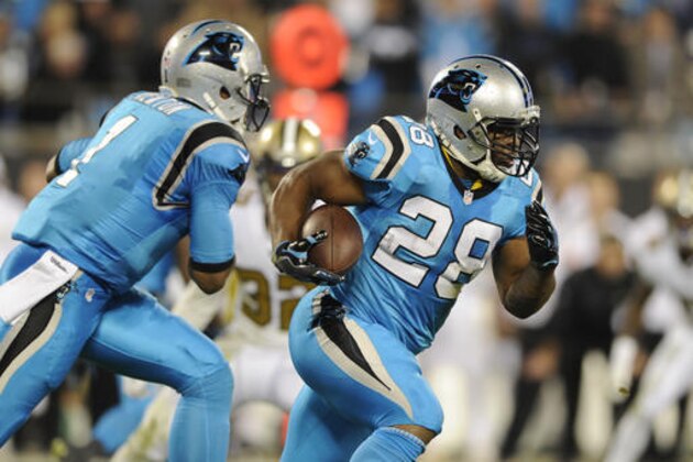 FILE - In this Nov. 17, 2016, file photo, Carolina Panthers' Jonathan Stewart (28) runs against the New Orleans Saints during an NFL football game in Charlotte, N.C. At left is quarterback Cam Newton. The Panthers play the Oakland Raiders this week. The Panthers are looking for ways to establish the running game, so expect a full dose of Stewart early in the game. (AP Photo/Mike McCarn, File)