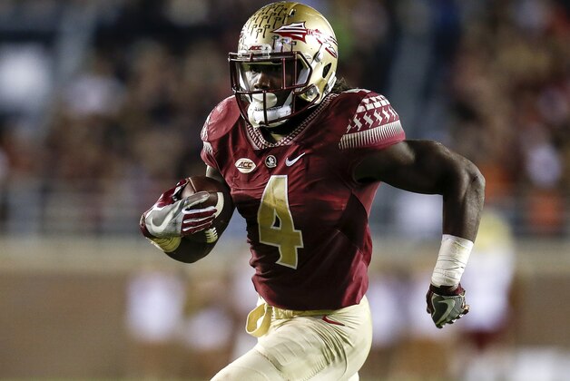 TALLAHASSEE, FL - NOVEMBER 11: Runningback Dalvin Cook #4 of the Florida State Seminoles on a running play during the game against the Boston College Eagles at Doak Campbell Stadium on Bobby Bowden Field on November 11, 2016 in Tallahassee, Florida. Florida State defeated Boston College 45 to 7. (Photo by Don Juan Moore/Getty Images)