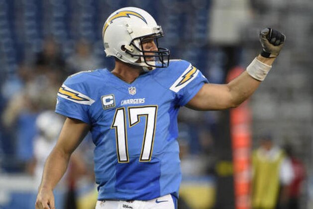 San Diego Chargers quarterback Philip Rivers pumps his fist after getting a first down during the second half of an NFL football game against the Tennessee Titans, Sunday, Nov. 6, 2016, in San Diego. The Chargers won 43-35. (AP Photo/Denis Poroy)
