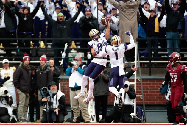 PULLMAN, WA - NOVEMBER 25:  Dante Pettis #8 of the Washington Huskies celebrates his touchdown with teammate John Ross #1 in the first half against the Washington State Cougars during the 109th Apple Cup at Martin Stadium on November 25, 2016 in Pullman, Washington.  (Photo by William Mancebo/Getty Images)