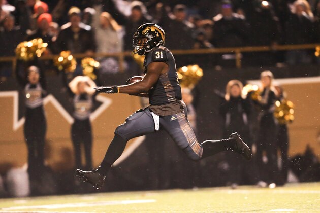 KALAMAZOO, MI - NOVEMBER 25:  Jarvion Franklin #31 of the Western Michigan Broncos runs the ball for a touchdown at Waldo Stadium on November 25, 2016 in Kalamazoo, Michigan. (Photo by Rey Del Rio/Getty Images)