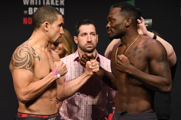 MELBOURNE, AUSTRALIA - NOVEMBER 26:    (L-R) Opponents Robert Whittaker of New Zealand and Derek Brunson face off during the UFC weigh-in at Rod Laver Arena on November 26, 2016 in Melbourne, Australia. (Photo by Jeff Bottari/Zuffa LLC/Zuffa LLC via Getty Images)