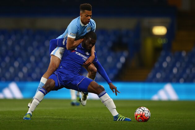 LONDON, ENGLAND - APRIL 27:  Lukas Nmecha of Manchester City tries to tackle Fikayo Tomori of Chelsea during the  FA Youth Cup Final - Second Leg match between Chelsea v Manchester City at Stamford Bridge on April 27, 2016 in London, England.  (Photo by Ian Walton/Getty Images)