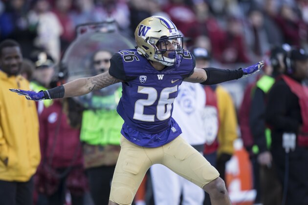 SEATTLE, WA - NOVEMBER 27: Defensive back Sidney Jones #26 of the Washington Huskies celebrates an in incomplete pass during the first half of play against the Washington State Cougars during a football game at Husky Stadium on November 27, 2015 in Seattle, Washington. (Photo by Stephen Brashear/Getty Images)