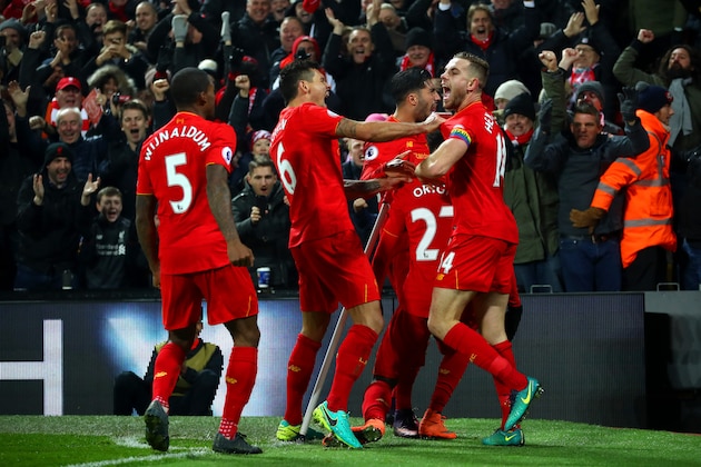 LIVERPOOL, ENGLAND - NOVEMBER 26:  Divock Origi (2nd R) of Liverpool celebrates scoring the opening goal with his team mates during the Premier League match between Liverpool and Sunderland at Anfield on November 26, 2016 in Liverpool, England.  (Photo by Clive Brunskill/Getty Images)