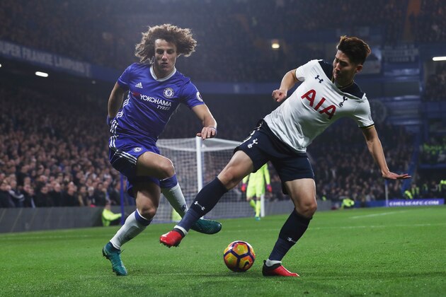 LONDON, ENGLAND - NOVEMBER 26: David Luiz of Chelsea and Heung-Min Son of Tottenham Hotspur compete for the ball during the Premier League match between Chelsea and Tottenham Hotspur at Stamford Bridge on November 26, 2016 in London, England.  (Photo by Clive Rose/Getty Images)