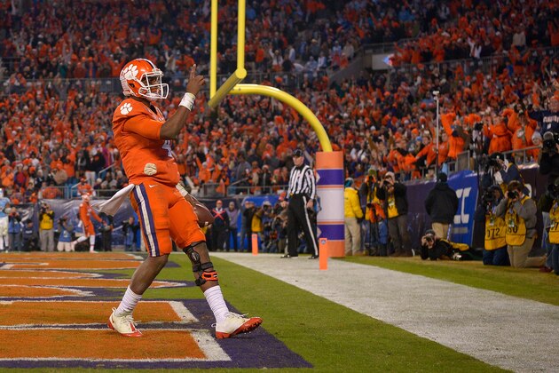 CHARLOTTE, NC - DECEMBER 05:  Deshaun Watson #4 of the Clemson Tigers celebrates after scoring a touchdown against the North Carolina Tar Heels during the Atlantic Coast Conference Football Championship at Bank of America Stadium on December 5, 2015 in Charlotte, North Carolina.  (Photo by Grant Halverson/Getty Images)