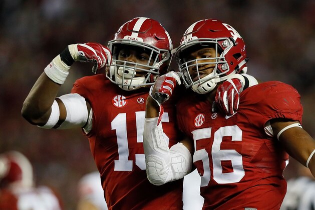TUSCALOOSA, AL - NOVEMBER 26:  Ronnie Harrison #15 and Tim Williams #56 of the Alabama Crimson Tide react after a defensive stop against the Auburn Tigers at Bryant-Denny Stadium on November 26, 2016 in Tuscaloosa, Alabama.  (Photo by Kevin C. Cox/Getty Images)