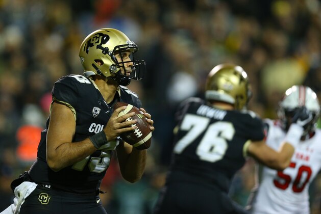 BOULDER, CO - NOVEMBER 26:  Quarterback Sefo Liufau #13 of the Colorado Buffaloes looks to pass during the first quarter against the Utah Utes at Folsom Field on November 26, 2016 in Boulder, Colorado. (Photo by Justin Edmonds/Getty Images)