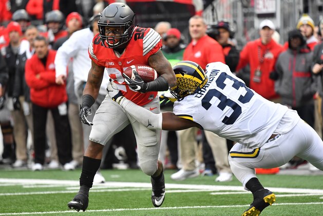 COLUMBUS, OH - NOVEMBER 26:   Mike Weber #25 of the Ohio State Buckeyes rushes the ball against the Michigan Wolverines at Ohio Stadium on November 26, 2016 in Columbus, Ohio.  (Photo by Jamie Sabau/Getty Images)