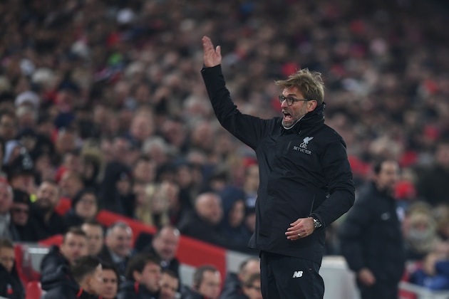 Liverpool's German manager Jurgen Klopp gestures and shouts at the crowd during the English Premier League football match between Liverpool and Sunderland at Anfield in Liverpool, north west England on November 26, 2016. / AFP / Paul ELLIS / RESTRICTED TO EDITORIAL USE. No use with unauthorized audio, video, data, fixture lists, club/league logos or 'live' services. Online in-match use limited to 75 images, no video emulation. No use in betting, games or single club/league/player publications.  /         (Photo credit should read PAUL ELLIS/AFP/Getty Images)