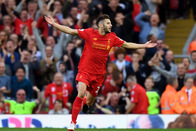 LIVERPOOL, ENGLAND - SEPTEMBER 10: Adam Lallana of Liverpool celebrates scoring his sides third goal during the Premier League match between Liverpool and Leicester City at Anfield on September 10, 2016 in Liverpool, England.  (Photo by Michael Regan/Getty Images)