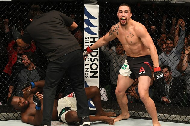 MELBOURNE, AUSTRALIA - NOVEMBER 27:   Robert Whittaker of New Zealand celebrates his TKO victory over Derek Brunson in their middleweight bout during the UFC Fight Night event at Rod Laver Arena on November 27, 2016 in Melbourne, Australia. (Photo by Jeff Bottari/Zuffa LLC/Zuffa LLC via Getty Images)