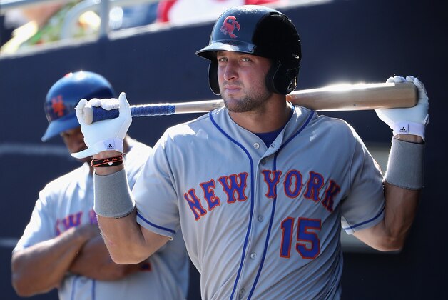 PEORIA, AZ - OCTOBER 13:  Tim Tebow #15 (New York Mets) of the Scottsdale Scorpions warms up in the dugout during the Arizona Fall League game against the Peoria Javelinas at Peoria Stadium on October 13, 2016 in Peoria, Arizona.  (Photo by Christian Petersen/Getty Images)