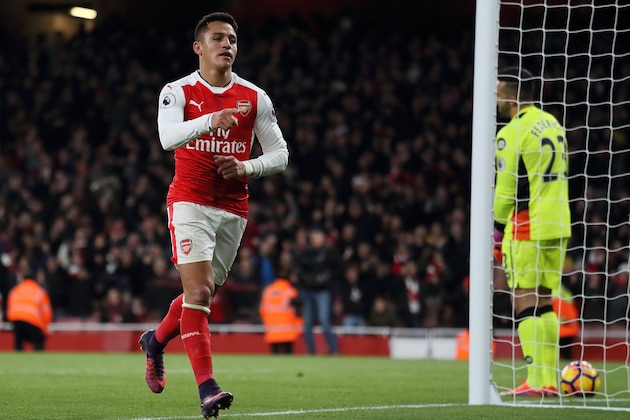 LONDON, ENGLAND - NOVEMBER 27:  Alexis Sanchez of Arsenal celebrates scoring his team's third goal during the Premier League match between Arsenal and AFC Bournemouth at Emirates Stadium on November 27, 2016 in London, England.  (Photo by Matthew Ashton - AMA/Getty Images)