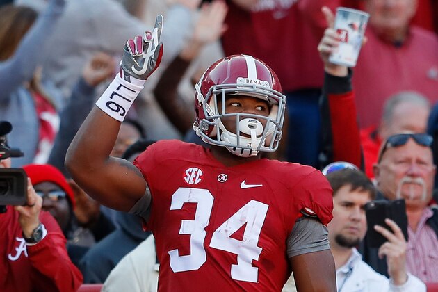 TUSCALOOSA, AL - NOVEMBER 26:  Damien Harris #34 of the Alabama Crimson Tide reacts after rushing for a touchdown against the Auburn Tigers at Bryant-Denny Stadium on November 26, 2016 in Tuscaloosa, Alabama.  (Photo by Kevin C. Cox/Getty Images)