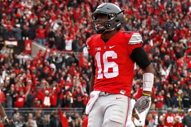 COLUMBUS, OH - NOVEMBER 26: J.T. Barrett #16 of the Ohio State Buckeyes celebrates after rushing for a touchdown in overtime against the Michigan Wolverines at Ohio Stadium on November 26, 2016 in Columbus, Ohio. (Photo by Gregory Shamus/Getty Images) COLUMBUS, OH - NOVEMBER 26: J.T. Barrett #16 of the Ohio State Buckeyes celebrates after rushing for a touchdown in overtime against the Michigan Wolverines at Ohio Stadium on November 26, 2016 in Columbus, Ohio. (Photo by Gregory Shamus/Getty Images)