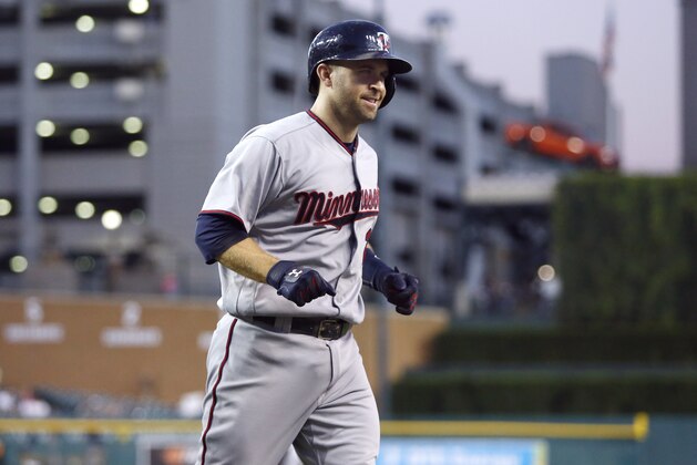 DETROIT, MI - SEPTEMBER 12:  Brian Dozier #2 of the Minnesota Twins smiles as he approaches the dugout after hitting his 40th home run during the third inning at Comerica Park on September 12, 2016 in Detroit, Michigan. (Photo by Duane Burleson/Getty Images)