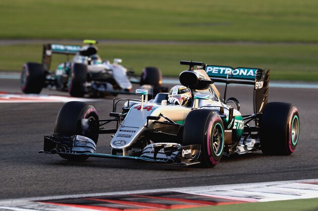 ABU DHABI, UNITED ARAB EMIRATES - NOVEMBER 27: Lewis Hamilton of Great Britain driving the (44) Mercedes AMG Petronas F1 Team Mercedes F1 WO7 Mercedes PU106C Hybrid turbo leads Nico Rosberg of Germany driving the (6) Mercedes AMG Petronas F1 Team Mercedes F1 WO7 Mercedes PU106C Hybrid turbo on track   during the Abu Dhabi Formula One Grand Prix at Yas Marina Circuit on November 27, 2016 in Abu Dhabi, United Arab Emirates.  (Photo by Lars Baron/Getty Images)