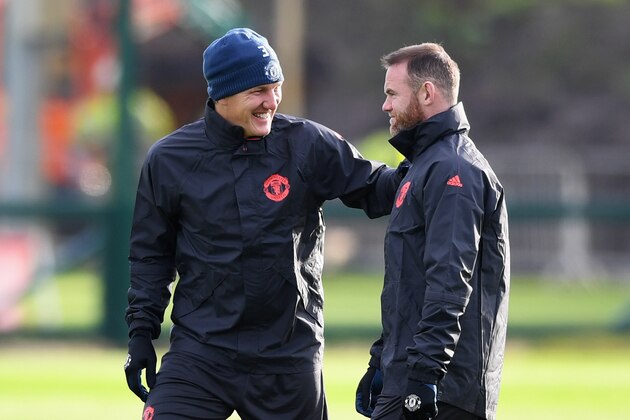 MANCHESTER, ENGLAND - NOVEMBER 23:  Wayne Rooney and Bastian Schweinsteiger in discussion during a Manchester United training session on the eve of their UEFA Europa League match against Feyenoord at Aon Training Complex on November 23, 2016 in Manchester, England.  (Photo by Gareth Copley/Getty Images)