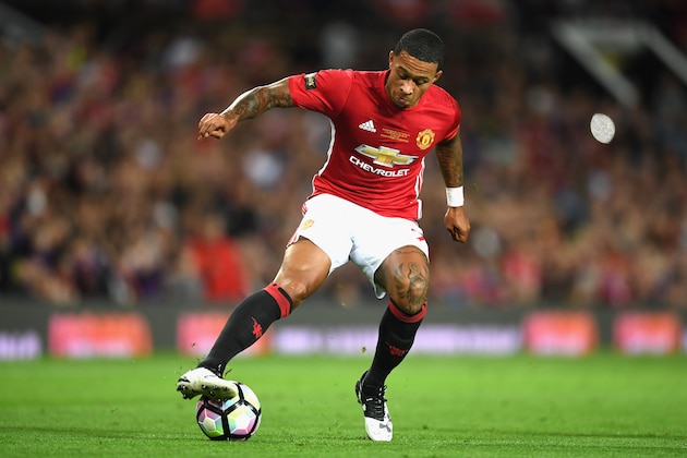MANCHESTER, ENGLAND - AUGUST 03:  Memphis Depay of Manchester United in action during the Wayne Rooney Testimonial match between Manchester United and Everton at Old Trafford on August 3, 2016 in Manchester, England.  (Photo by Michael Regan/Getty Images)