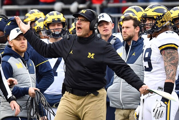 COLUMBUS, OH - NOVEMBER 26:   Head coach Jim Harbaugh of the Michigan Wolverines argues a call on the sideline during the second half against the Ohio State Buckeyes at Ohio Stadium on November 26, 2016 in Columbus, Ohio.  (Photo by Jamie Sabau/Getty Images)