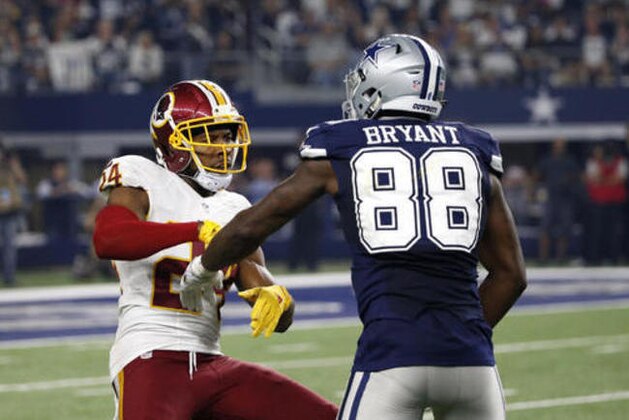 Washington Redskins' Josh Norman (24) and Dallas Cowboys' Dez Bryant (88) match up against each other in the second half of an NFL football game, Thursday, Nov. 24, 2016, in Arlington, Texas. (AP Photo/Michael Ainsworth)
