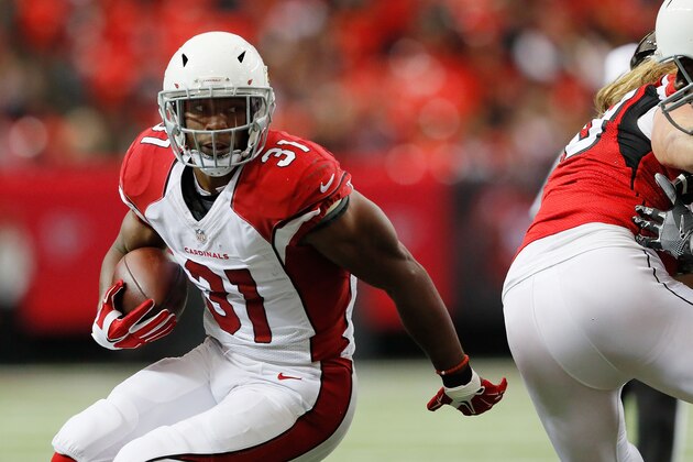 ATLANTA, GA - NOVEMBER 27: David Johnson #31 of the Arizona Cardinals runs the ball during the first half against the Atlanta Falcons  at the Georgia Dome on November 27, 2016 in Atlanta, Georgia. (Photo by Kevin C.  Cox/Getty Images)