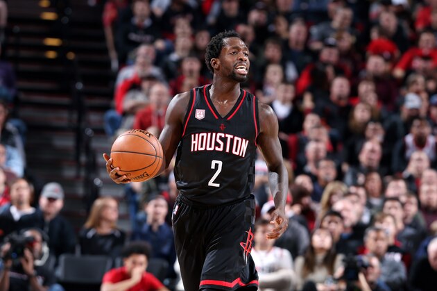 PORTLAND, OR - NOVEMBER 27: Patrick Beverley #2 of the Houston Rockets brings the ball up court during the game against the Portland Trail Blazers on November 27, 2016 at the Moda Center in Portland, Oregon. NOTE TO USER: User expressly acknowledges and agrees that, by downloading and or using this Photograph, user is consenting to the terms and conditions of the Getty Images License Agreement. Mandatory Copyright Notice: Copyright 2016 NBAE (Photo by Sam Forencich/NBAE via Getty Images)