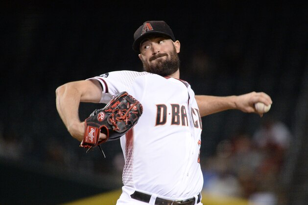 PHOENIX, AZ - AUGUST 15:  Robbie Ray #38 of the Arizona Diamondbacks delivers a pitch during the first inning against the New York Mets at Chase Field on August 15, 2016 in Phoenix, Arizona.  (Photo by Jennifer Stewart/Getty Images)