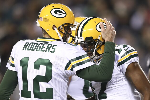 PHILADELPHIA, PA - NOVEMBER 28: Aaron Rodgers #12 and Davante Adams #17 of the Green Bay Packers celebrate after a touchdown in the first quarter against the Philadelphia Eagles at Lincoln Financial Field on November 28, 2016 in Philadelphia, Pennsylvania. (Photo by Elsa/Getty Images)