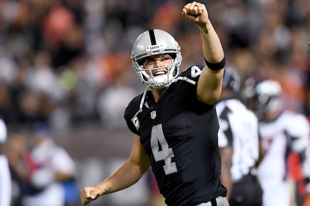 OAKLAND, CA - NOVEMBER 06:  Derek Carr #4 of the Oakland Raiders celebrates after they scored a touchdown against the Denver Broncos in the second quarter of an NFL football game at the Oakland-Alameda County Coliseum on November 6, 2016 in Oakland, California.  (Photo by Thearon W. Henderson/Getty Images)